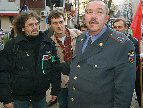 In the course of protest action in Krasnodar on December 5, militiamen detain Andrei Rudomakha (on the left), coordinator of the "Ecological Watch for Northern Caucasus". Photo by the "Caucasian Knot" In the course of protest action in Krasnodar on December 5, militiamen detain Andrei Rudomakha (on the left), coordinator of the "Ecological Watch for Northern Caucasus". Photo by the "Caucasian Knot"