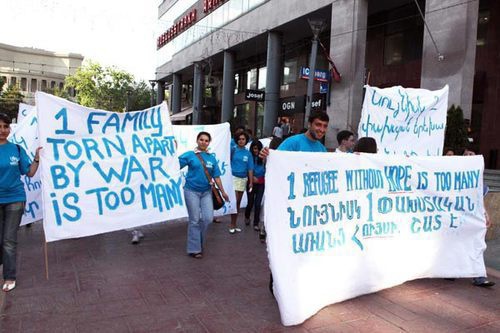 Armenian refugees from Azerbaijan march along streets with posters. Yerevan, June 20, 2011. Photo: Photolure Armenian refugees from Azerbaijan march along streets with posters. Yerevan, June 20, 2011. Photo: Photolure