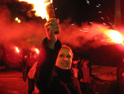 Participant of torch march of nationalists on the anniversary of Manege Square riots in Moscow after the murder of the football fan Yegor Sviridov, Volgograd, December 11, 2011. Photo by Vyacheslav Yaschenko for the "Caucasian Knot" Participant of torch march of nationalists on the anniversary of Manege Square riots in Moscow after the murder of the football fan Yegor Sviridov, Volgograd, December 11, 2011. Photo by Vyacheslav Yaschenko for the "Caucasian Knot"