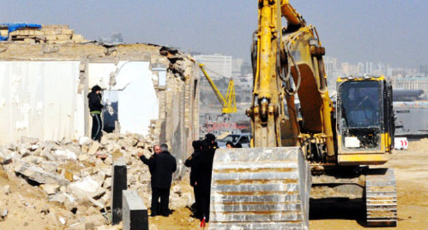 Demolition of houses in the area adjacent to the Flag Square in Baku, February 27, 2012. Courtesy of the Institute for Reporters' Freedom and Safety, www.irfs.az Demolition of houses in the area adjacent to the Flag Square in Baku, February 27, 2012. Courtesy of the Institute for Reporters' Freedom and Safety, www.irfs.az
