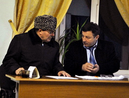 Magomed Idrisov (on the right), Chairman of the Precinct Election Commission (PEC) No. 1147, with some unidentified person, who accused observers from the "Novaya Gazeta" of illegal agitation, Dagestan, Makhachkala, March 4, 2012. Photo by Gurizada Kamalova, http://gurizada.livejournal.com/ Magomed Idrisov (on the right), Chairman of the Precinct Election Commission (PEC) No. 1147, with some unidentified person, who accused observers from the "Novaya Gazeta" of illegal agitation, Dagestan, Makhachkala, March 4, 2012. Photo by Gurizada Kamalova, http://gurizada.livejournal.com/