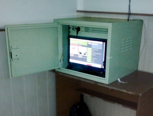 Polling Station No. 307 in the city of Chegem, Kabardino-Balkaria, March 4, 2012; the monitor for displaying the voting data from the software/hardware complex is stored in a fireproof safe. Photo by Grigory Shvedov for the "Caucasian Knot" Polling Station No. 307 in the city of Chegem, Kabardino-Balkaria, March 4, 2012; the monitor for displaying the voting data from the software/hardware complex is stored in a fireproof safe. Photo by Grigory Shvedov for the "Caucasian Knot"