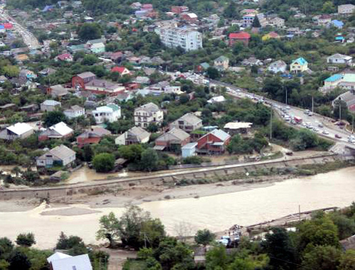 Top view of the flooded village of Novomikhailovsky, Tuapse District of the Krasnodar Territory, August 22, 2012. Courtesy of the press service of the Department for Krasnodar Territory of the Russian Ministry for Emergencies, www.23.mchs.gov.ru Top view of the flooded village of Novomikhailovsky, Tuapse District of the Krasnodar Territory, August 22, 2012. Courtesy of the press service of the Department for Krasnodar Territory of the Russian Ministry for Emergencies, www.23.mchs.gov.ru