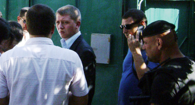 Court marshals and Mayoralty officials visiting the Mzokov family; Sochi, 17 Jan Fabricius Street; September 18, 2012. Photo by Svetlana Mzokova Court marshals and Mayoralty officials visiting the Mzokov family; Sochi, 17 Jan Fabricius Street; September 18, 2012. Photo by Svetlana Mzokova