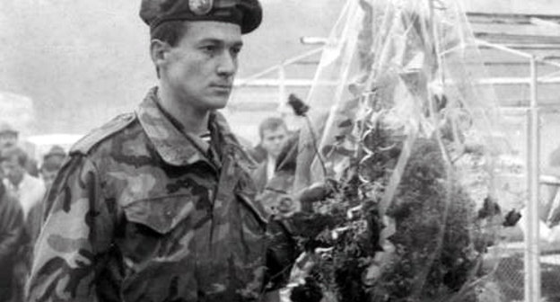 Abkhazian volunteers laying flowers at the boulder set in honour of the casualties victims of the 1992-1993 Georgian-Abkhaz conflict; Nalchik, Abkhazian Square, 1996, Courtesy of the magazine "Archives and Society", No. 18 Abkhazian volunteers laying flowers at the boulder set in honour of the casualties victims of the 1992-1993 Georgian-Abkhaz conflict; Nalchik, Abkhazian Square, 1996, Courtesy of the magazine "Archives and Society", No. 18
