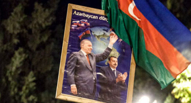 Poster of Ilham Aliev supporters. Baku, October 9, 2013. Photo by Aziz Karimov for the ‘Caucasian Knot’. Poster of Ilham Aliev supporters. Baku, October 9, 2013. Photo by Aziz Karimov for the ‘Caucasian Knot’.