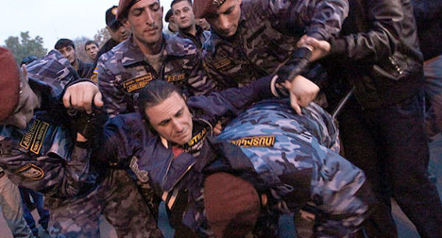 Police detains the participants of the protest action "Million Mask March". Yerevan, November 5, 2013. Photo: © PanARMENIAN Photo/Hrant Khachatryan Police detains the participants of the protest action "Million Mask March". Yerevan, November 5, 2013. Photo: © PanARMENIAN Photo/Hrant Khachatryan