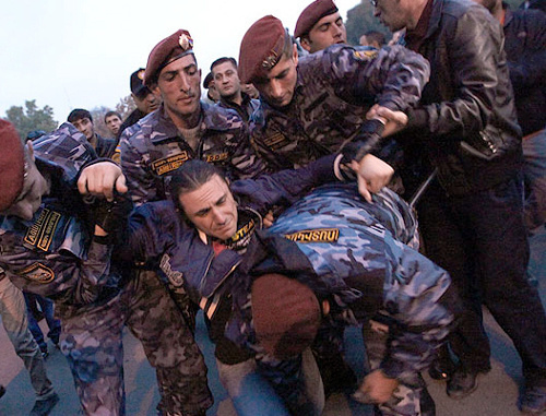 Police detains the participants of the protest action "Million Mask March". Yerevan, November 5, 2013. Photo: © PanARMENIAN Photo/Hrant Khachatryan Police detains the participants of the protest action "Million Mask March". Yerevan, November 5, 2013. Photo: © PanARMENIAN Photo/Hrant Khachatryan