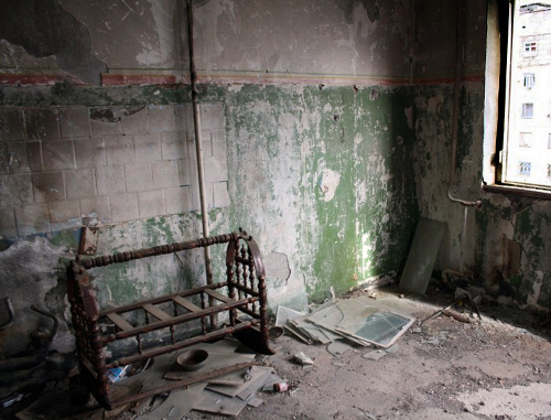 One of the damaged flats on the 7th floor of the house destroyed during the warfare in August 2008. South Ossetia, Tskhinvali, December 2, 2013. Photo by Mariya Kotaeva for the "Caucasian Knot" One of the damaged flats on the 7th floor of the house destroyed during the warfare in August 2008. South Ossetia, Tskhinvali, December 2, 2013. Photo by Mariya Kotaeva for the "Caucasian Knot"