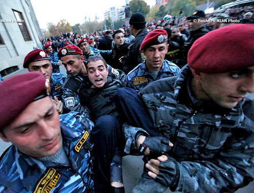 Detention of the participants of the protest action "Million Mask March". Yerevan, November 5, 2013. Photo: PanARMENIAN Photo/Hrant Khachatryan Detention of the participants of the protest action "Million Mask March". Yerevan, November 5, 2013. Photo: PanARMENIAN Photo/Hrant Khachatryan