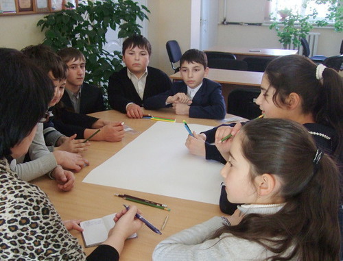 Schoolchildren from seven Ossetian and Ingush schools of the Prigorodny District of North Ossetia took part in the children's New Year party. Oktyabrskoe village, December 25, 2013. Photo provided by Yulia Chardina, the leader of the project "Harmonization of Interethnic Relations in Prigorodny District through small business development". Schoolchildren from seven Ossetian and Ingush schools of the Prigorodny District of North Ossetia took part in the children's New Year party. Oktyabrskoe village, December 25, 2013. Photo provided by Yulia Chardina, the leader of the project "Harmonization of Interethnic Relations in Prigorodny District through small business development".