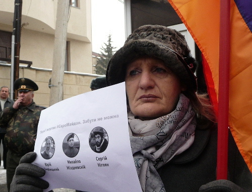 Participant of the rally in support of the Ukrainian Euromaidan. Yerevan, January 24, 2014. Photo by Armine Martirosyan. Participant of the rally in support of the Ukrainian Euromaidan. Yerevan, January 24, 2014. Photo by Armine Martirosyan.