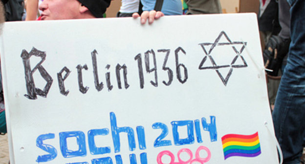 Poster against homophobia at the rally with an appeal to boycott Sochi Olympic Games. Berlin, August 31, 2013. Photo: Adam Groffmann, http://www.flickr.com/ Poster against homophobia at the rally with an appeal to boycott Sochi Olympic Games. Berlin, August 31, 2013. Photo: Adam Groffmann, http://www.flickr.com/