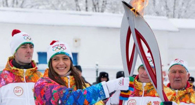Olympic Torch Relay in Nalchik. Kabardino-Balkaria, January 30, 2014. Photo http://torchrelay.sochi2014.com/ Olympic Torch Relay in Nalchik. Kabardino-Balkaria, January 30, 2014. Photo http://torchrelay.sochi2014.com/