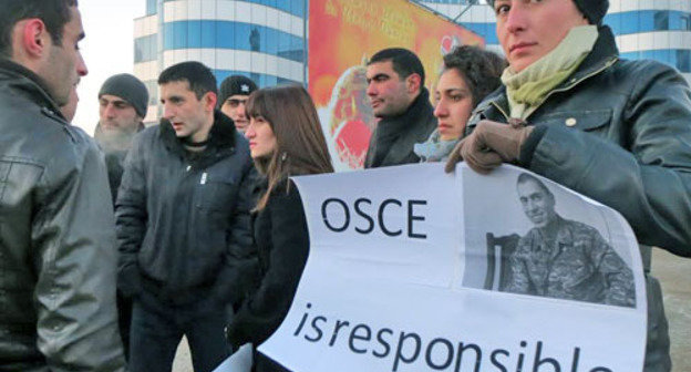 Activists of the youth wing of the ARF "Dashnaktsutyun" Party held a rally demanding to objectively investigate the incidents on the contact line of the Karabakh conflict. Stepanakert, February 7, 2014. Photo by Alvard Grigoryan for the ‘Caucasian Knot’. Activists of the youth wing of the ARF "Dashnaktsutyun" Party held a rally demanding to objectively investigate the incidents on the contact line of the Karabakh conflict. Stepanakert, February 7, 2014. Photo by Alvard Grigoryan for the ‘Caucasian Knot’.