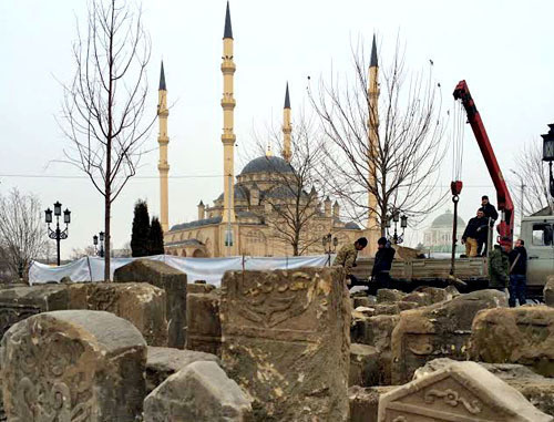 The gravestones monuments, which constituted the main part of the composition of the Memorial to victims of the deportation in 1944, are transferred to the territory of the complex, dedicated to the memory of the fallen employees of the Chechen power structures, located in Akhmat Kadyrov Square. Grozny, February 14, 2014. Photo by an eyewitness The gravestones monuments, which constituted the main part of the composition of the Memorial to victims of the deportation in 1944, are transferred to the territory of the complex, dedicated to the memory of the fallen employees of the Chechen power structures, located in Akhmat Kadyrov Square. Grozny, February 14, 2014. Photo by an eyewitness