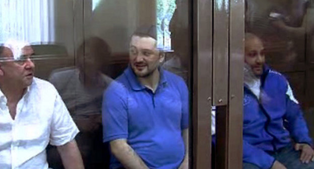 Defendants in the case of the murder of Anna Politkovskaya - Lom-Ali Gaitukaev, Rustam Makhmudov and Sergey Khadjikurbanov at the Moscow Court, June 4, 2013. Screenshot from video records of the Moscow Court press-service. Defendants in the case of the murder of Anna Politkovskaya - Lom-Ali Gaitukaev, Rustam Makhmudov and Sergey Khadjikurbanov at the Moscow Court, June 4, 2013. Screenshot from video records of the Moscow Court press-service.