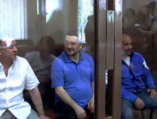 Defendants in the case of the murder of Anna Politkovskaya - Lom-Ali Gaitukaev, Rustam Makhmudov and Sergey Khadjikurbanov at the Moscow Court, June 4, 2013. Screenshot from video records of the Moscow Court press-service. Defendants in the case of the murder of Anna Politkovskaya - Lom-Ali Gaitukaev, Rustam Makhmudov and Sergey Khadjikurbanov at the Moscow Court, June 4, 2013. Screenshot from video records of the Moscow Court press-service.
