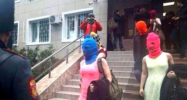 Pussy Riot members going out from Sochi police department. February 18, 2014. Photo from the Twitter account of ‘Voina’ group activists, http://twitter.com/gruppa_voina/status/435830304725794816/ Pussy Riot members going out from Sochi police department. February 18, 2014. Photo from the Twitter account of ‘Voina’ group activists, http://twitter.com/gruppa_voina/status/435830304725794816/