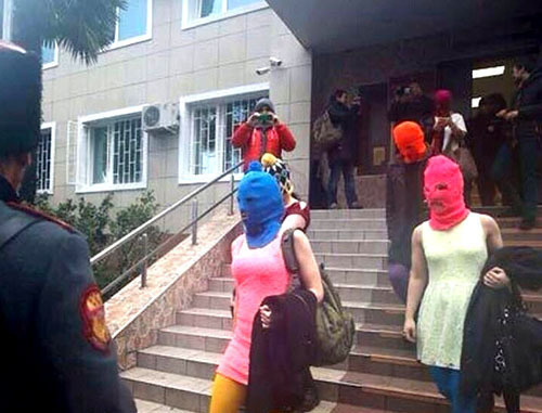 Pussy Riot members going out from Sochi police department. February 18, 2014. Photo from the Twitter account of ‘Voina’ group activists, http://twitter.com/gruppa_voina/status/435830304725794816/ Pussy Riot members going out from Sochi police department. February 18, 2014. Photo from the Twitter account of ‘Voina’ group activists, http://twitter.com/gruppa_voina/status/435830304725794816/