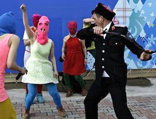 A brawl between Cossaks and Pussy Riot band and the art-group "Voina" members. Sochi, February 19, 2014. Photo from activists’ Twitter account, http://twitter.com/gruppa_voina/status/435830304725794816/ A brawl between Cossaks and Pussy Riot band and the art-group "Voina" members. Sochi, February 19, 2014. Photo from activists’ Twitter account, http://twitter.com/gruppa_voina/status/435830304725794816/