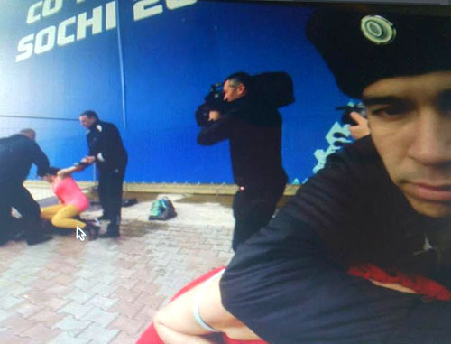 A brawl between Cossaks and Pussy Riot band and the art-group "Voina" members. Sochi, February 19, 2014. Photo from the activists’ Twitter account, http://twitter.com/gruppa_voina/status/435830304725794816/ A brawl between Cossaks and Pussy Riot band and the art-group "Voina" members. Sochi, February 19, 2014. Photo from the activists’ Twitter account, http://twitter.com/gruppa_voina/status/435830304725794816/