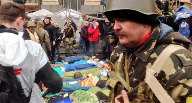 Maidan defenders paying tribute to their perished comrades. Kiev, February 21, 2014. Photo: Jeroen Akkermans, RTL News Berlin Maidan defenders paying tribute to their perished comrades. Kiev, February 21, 2014. Photo: Jeroen Akkermans, RTL News Berlin