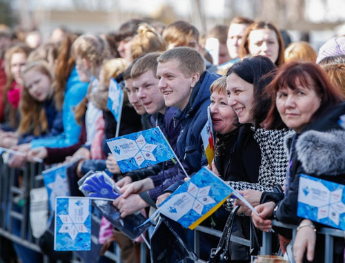 People greeting Paralympic Torch Relay in Elizavetinskaya Cossack village. Krasnodar Region, March 5, 2014. Photo: http://admkrai.krasnodar.ru/ People greeting Paralympic Torch Relay in Elizavetinskaya Cossack village. Krasnodar Region, March 5, 2014. Photo: http://admkrai.krasnodar.ru/