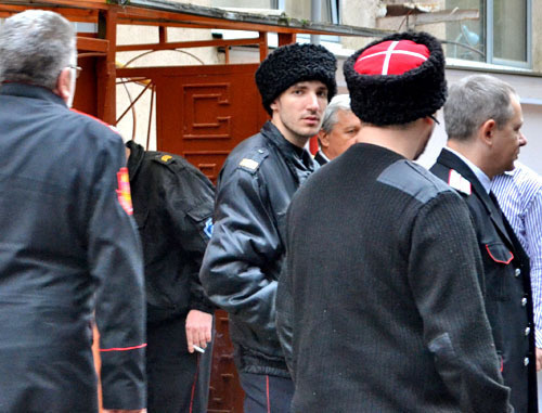 Cossacks before general assembly, where the decision was made to expel Grigory Uchkurov from their ranks. Sochi, March 4, 2014. Photo by Svetlana Kravchenko for the ‘Caucasian Knot’. Cossacks before general assembly, where the decision was made to expel Grigory Uchkurov from their ranks. Sochi, March 4, 2014. Photo by Svetlana Kravchenko for the ‘Caucasian Knot’.