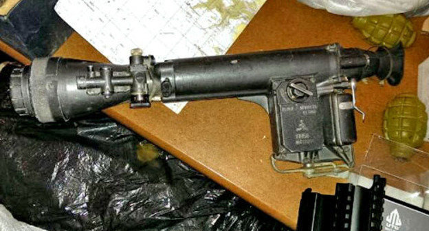 A large hiding with weapons and ammunition found in the house by the FSB officers. Dagestan, Buynaksk, March 11, 2014. Photo by http://nac.gov.ru/ A large hiding with weapons and ammunition found in the house by the FSB officers. Dagestan, Buynaksk, March 11, 2014. Photo by http://nac.gov.ru/