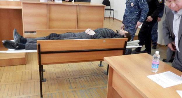Suleiman Edigov (in the centre) in the Supreme Court of Chechnya on March 26, 2014. Photo by the Public Oversight Commission of Chechnya "Committee Against Torture", http://pytkam.net/ Suleiman Edigov (in the centre) in the Supreme Court of Chechnya on March 26, 2014. Photo by the Public Oversight Commission of Chechnya "Committee Against Torture", http://pytkam.net/
