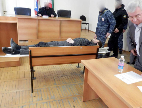 Suleiman Edigov (in the centre) in the Supreme Court of Chechnya on March 26, 2014. Photo by the Public Oversight Commission of Chechnya "Committee Against Torture", http://pytkam.net/ Suleiman Edigov (in the centre) in the Supreme Court of Chechnya on March 26, 2014. Photo by the Public Oversight Commission of Chechnya "Committee Against Torture", http://pytkam.net/
