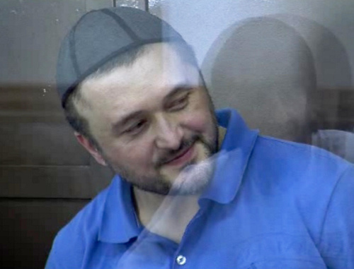 Rustam Makhmudov accused of the murder of Anna Politkovskaya, in the courtroom. June 4, 2013. Screenshot of a video by the press service of the Moscow City Court, http://www.mos-gorsud.ru/video/sudzs/?pn=0&id=168 Rustam Makhmudov accused of the murder of Anna Politkovskaya, in the courtroom. June 4, 2013. Screenshot of a video by the press service of the Moscow City Court, http://www.mos-gorsud.ru/video/sudzs/?pn=0&id=168