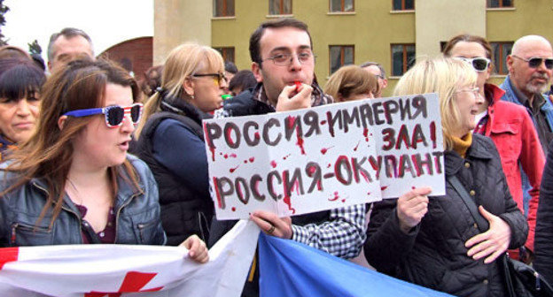 Protest action against TV Bridge with Russia. Tbilisi, March 28, 2014. Photo by Edita Badasyan for the "Caucasian Knot" Protest action against TV Bridge with Russia. Tbilisi, March 28, 2014. Photo by Edita Badasyan for the "Caucasian Knot"