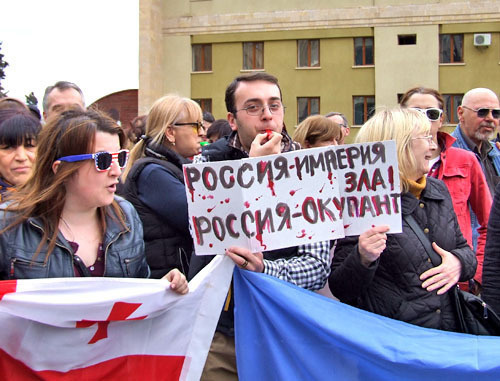 Protest action against TV Bridge with Russia. Tbilisi, March 28, 2014. Photo by Edita Badasyan for the "Caucasian Knot" Protest action against TV Bridge with Russia. Tbilisi, March 28, 2014. Photo by Edita Badasyan for the "Caucasian Knot"