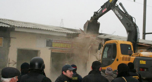 Demolition of illegally constructed building by court marshals. Dagestan, 2012. Photo from the archive of Dagestan UFSSP press-service, http://r05.fssprus.ru Demolition of illegally constructed building by court marshals. Dagestan, 2012. Photo from the archive of Dagestan UFSSP press-service, http://r05.fssprus.ru