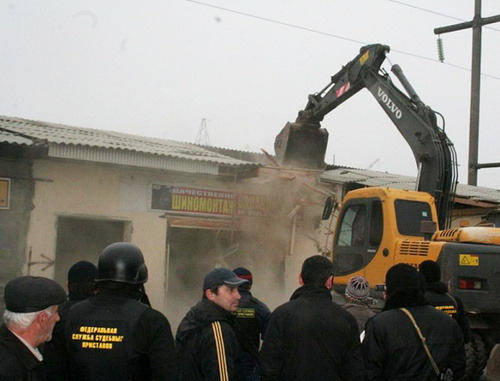 Demolition of illegally constructed building by court marshals. Dagestan, 2012. Photo from the archive of Dagestan UFSSP press-service, http://r05.fssprus.ru Demolition of illegally constructed building by court marshals. Dagestan, 2012. Photo from the archive of Dagestan UFSSP press-service, http://r05.fssprus.ru