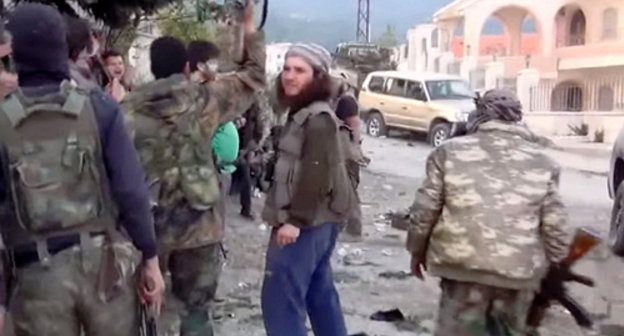 Militants in Latakia, Syria, March 25, 2014. Screenshot from Youtube video, http://www.youtube.com/watch?v=ER5H2Thyf5g Militants in Latakia, Syria, March 25, 2014. Screenshot from Youtube video, http://www.youtube.com/watch?v=ER5H2Thyf5g