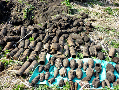 A hideout with grenades and shells of the Russian Civil War found by the local ethnographic expedition "Native Landscape", headed by Victor Kotlyarov and Maria Kotlyarova. Kabardino-Balkaria, April 22, 2014. Photo by Lyudmila Maratova A hideout with grenades and shells of the Russian Civil War found by the local ethnographic expedition "Native Landscape", headed by Victor Kotlyarov and Maria Kotlyarova. Kabardino-Balkaria, April 22, 2014. Photo by Lyudmila Maratova