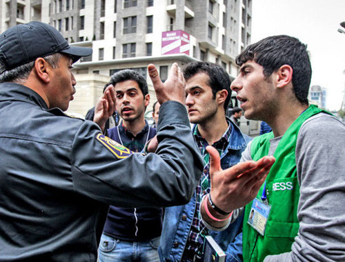 Police dispersing participants of the rally in support of Nida activists gathered near the court. Baku, May 1, 2014. Photo by Aziz Karimov for the ‘Caucasian Knot’. Police dispersing participants of the rally in support of Nida activists gathered near the court. Baku, May 1, 2014. Photo by Aziz Karimov for the ‘Caucasian Knot’.
