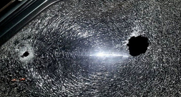 Traces of bullets in a car window. Photo: http://nac.gov.ru/ Traces of bullets in a car window. Photo: http://nac.gov.ru/