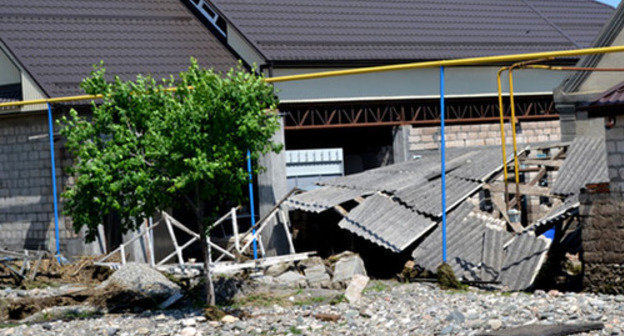 House of a woman whose home suffered from the flood. Baksan District of the Kabardino-Balkarian Republic (KBR), May 2014. Photo: the official site of the Baksan District of the KBR, http://www.ba.adm-kbr.ru/ House of a woman whose home suffered from the flood. Baksan District of the Kabardino-Balkarian Republic (KBR), May 2014. Photo: the official site of the Baksan District of the KBR, http://www.ba.adm-kbr.ru/