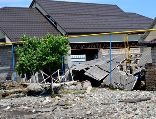 House of a woman whose home suffered from the flood. Baksan District of the Kabardino-Balkarian Republic (KBR), May 2014. Photo: the official site of the Baksan District of the KBR, http://www.ba.adm-kbr.ru/ House of a woman whose home suffered from the flood. Baksan District of the Kabardino-Balkarian Republic (KBR), May 2014. Photo: the official site of the Baksan District of the KBR, http://www.ba.adm-kbr.ru/