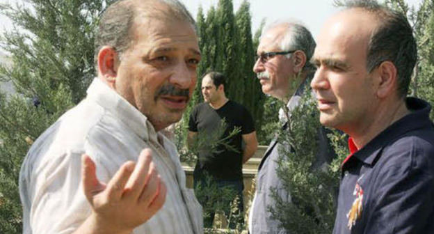 Rauf Mirkadirov (to the left) at the funeral of his father. Baku, May 24, 2014. Photo IA "Turan" Rauf Mirkadirov (to the left) at the funeral of his father. Baku, May 24, 2014. Photo IA "Turan"