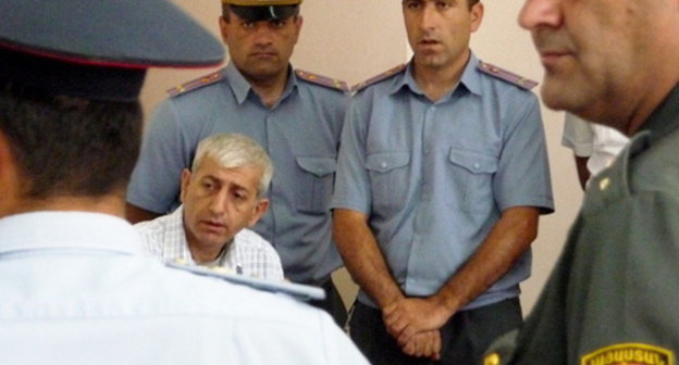 Arrested organizer of ‘Million Mask March’ Shant Arutyunyan in the court, Yerevan, June 12, 2014. Photo by Armine Martirosyan for the ‘Caucasian Knot’. Arrested organizer of ‘Million Mask March’ Shant Arutyunyan in the court, Yerevan, June 12, 2014. Photo by Armine Martirosyan for the ‘Caucasian Knot’.