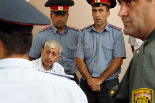 Arrested organizer of ‘Million Mask March’ Shant Arutyunyan in the court, Yerevan, June 12, 2014. Photo by Armine Martirosyan for the ‘Caucasian Knot’. Arrested organizer of ‘Million Mask March’ Shant Arutyunyan in the court, Yerevan, June 12, 2014. Photo by Armine Martirosyan for the ‘Caucasian Knot’.