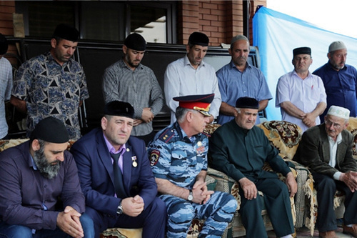 Chechnya MIA head Ruslan Alkhanov (in the centre) gives his condolences to the relatives of policeman Akhmed Dopaev killed in Grozny on June 22, 2014. Photo by Chechnya MIA head, http://95.mvd.ru/news/item/2315395 Chechnya MIA head Ruslan Alkhanov (in the centre) gives his condolences to the relatives of policeman Akhmed Dopaev killed in Grozny on June 22, 2014. Photo by Chechnya MIA head, http://95.mvd.ru/news/item/2315395