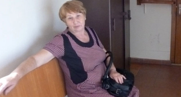 Nina Dubovaya, who was dismissed the claim of the Mayoralty asking to recognize the construction of the building illegal and demolish the unfinished. structure built near her land plot. Sochi, July 2014. Photo by Svetlana Kravchenko for the "Caucasian Knot" Nina Dubovaya, who was dismissed the claim of the Mayoralty asking to recognize the construction of the building illegal and demolish the unfinished. structure built near her land plot. Sochi, July 2014. Photo by Svetlana Kravchenko for the "Caucasian Knot"