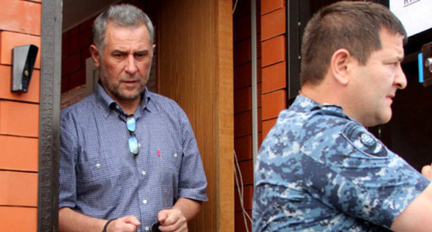 Ruslan Kutaev leaving the building of Urus-Martan City Court. Chechnya, June 2014. Photo by Magomed Magomedov for the ‘Caucasian Knot’. Ruslan Kutaev leaving the building of Urus-Martan City Court. Chechnya, June 2014. Photo by Magomed Magomedov for the ‘Caucasian Knot’.