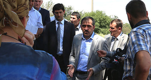 Meeting of Yunus-Bek Evkurov (in the centre) with refugees in Karabulak. Ingushetia, July 2, 2014. Photo by the press service of the leader of Ingushetia Meeting of Yunus-Bek Evkurov (in the centre) with refugees in Karabulak. Ingushetia, July 2, 2014. Photo by the press service of the leader of Ingushetia